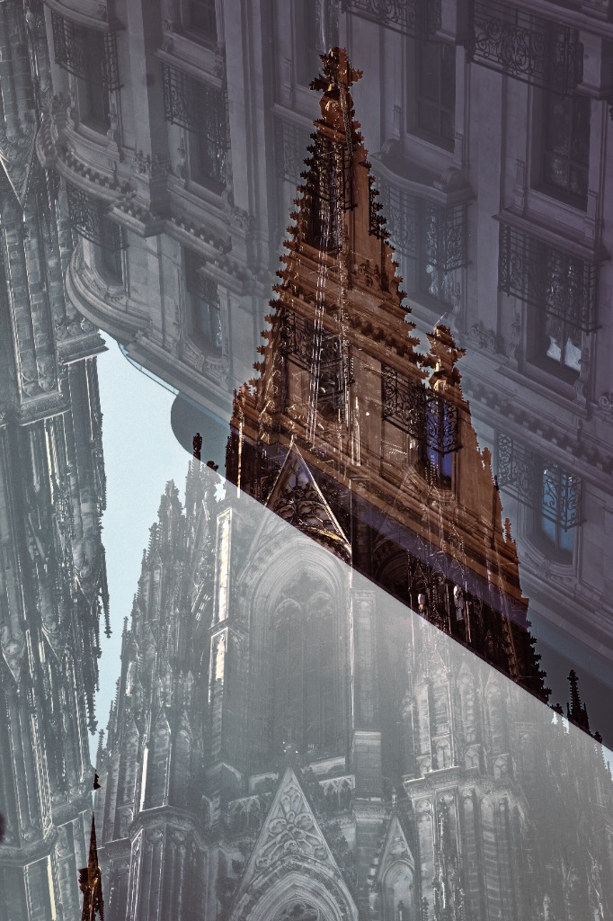 Fine art reflection of cathedral spire and architecture